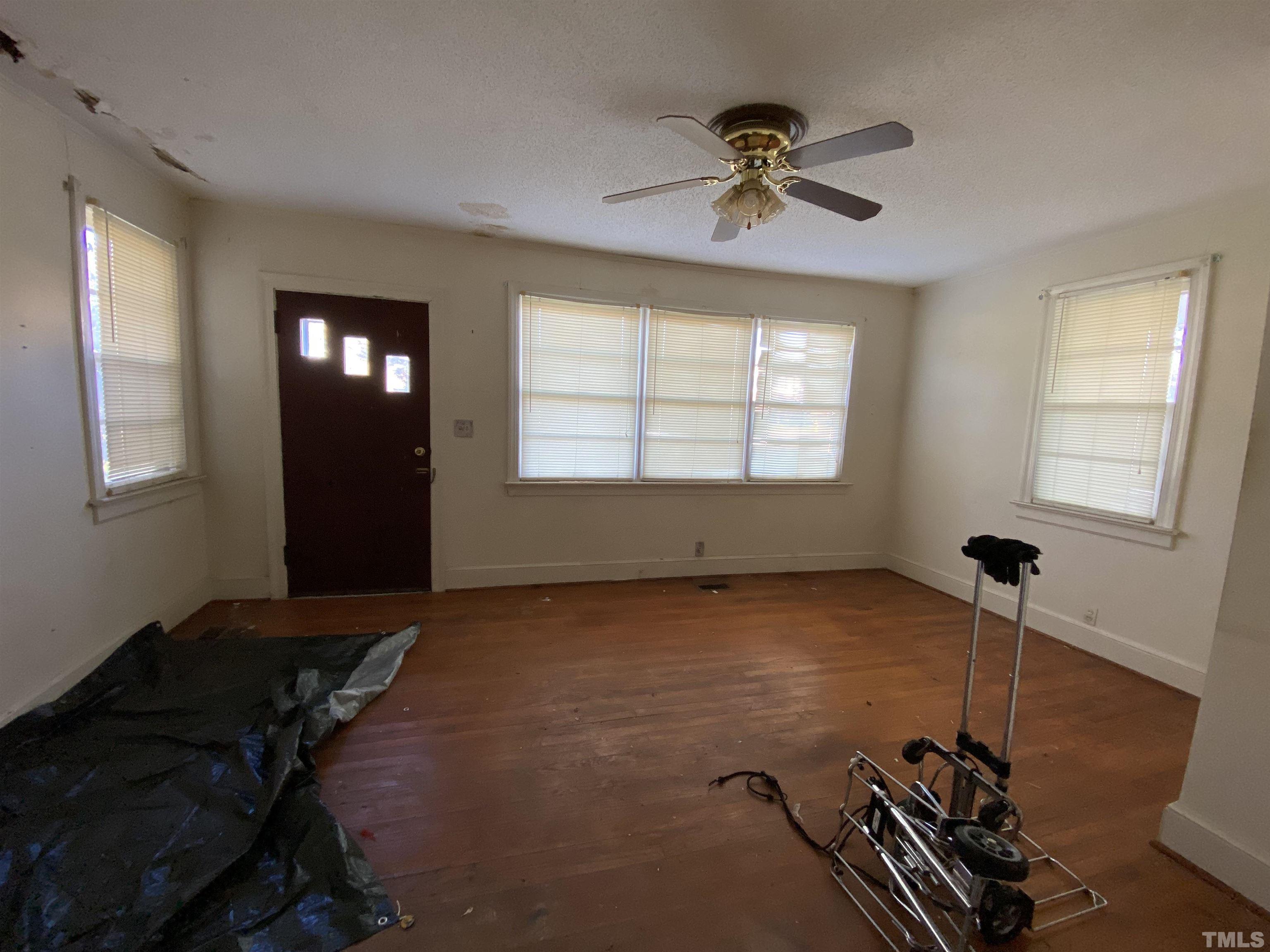 4015 St James Church Road Raleigh, NC 27604 - Photo 7 of 13 a view of a room with gym equipment