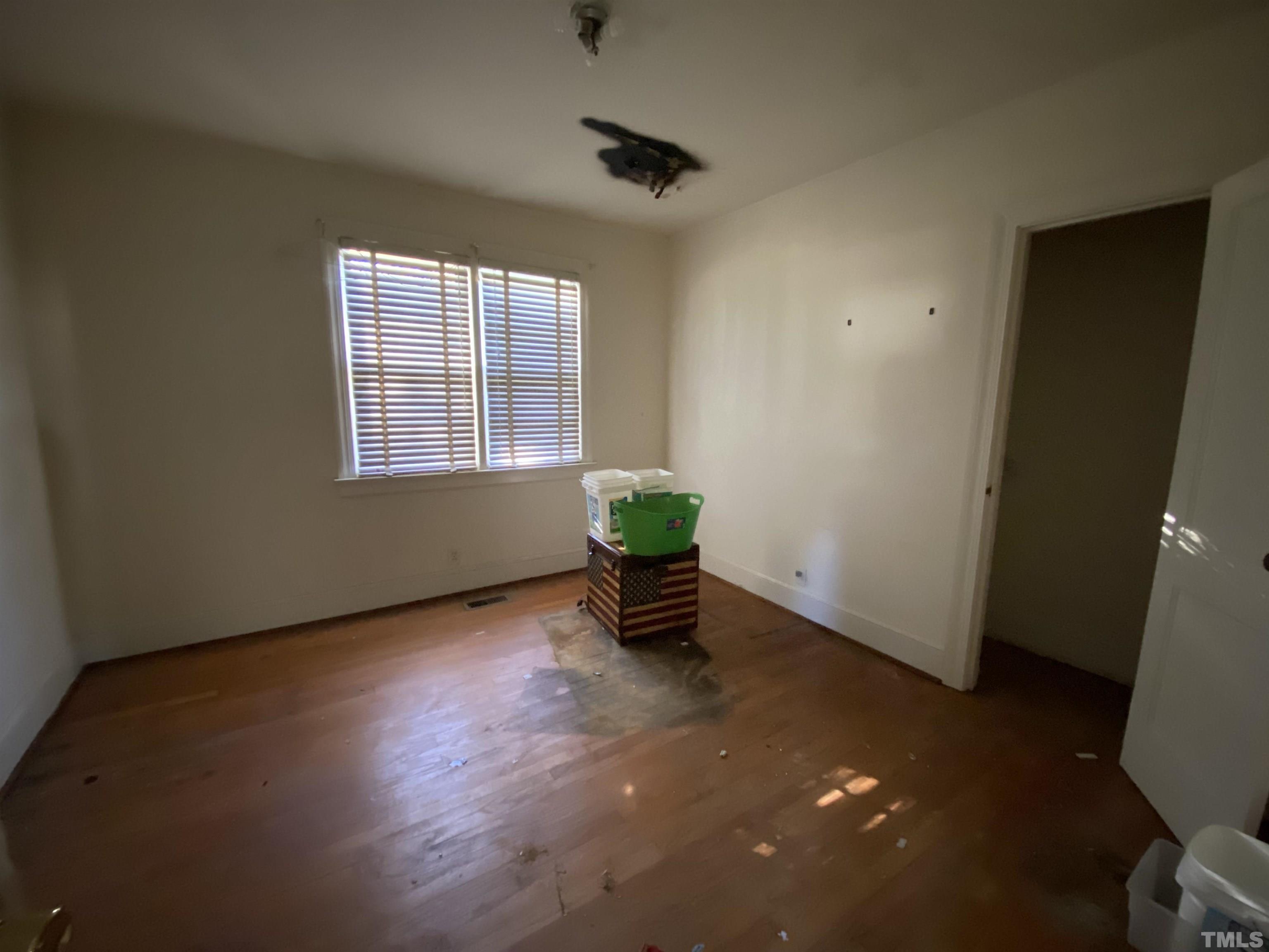 4015 St James Church Road Raleigh, NC 27604 - Photo 10 of 13 an empty room with windows