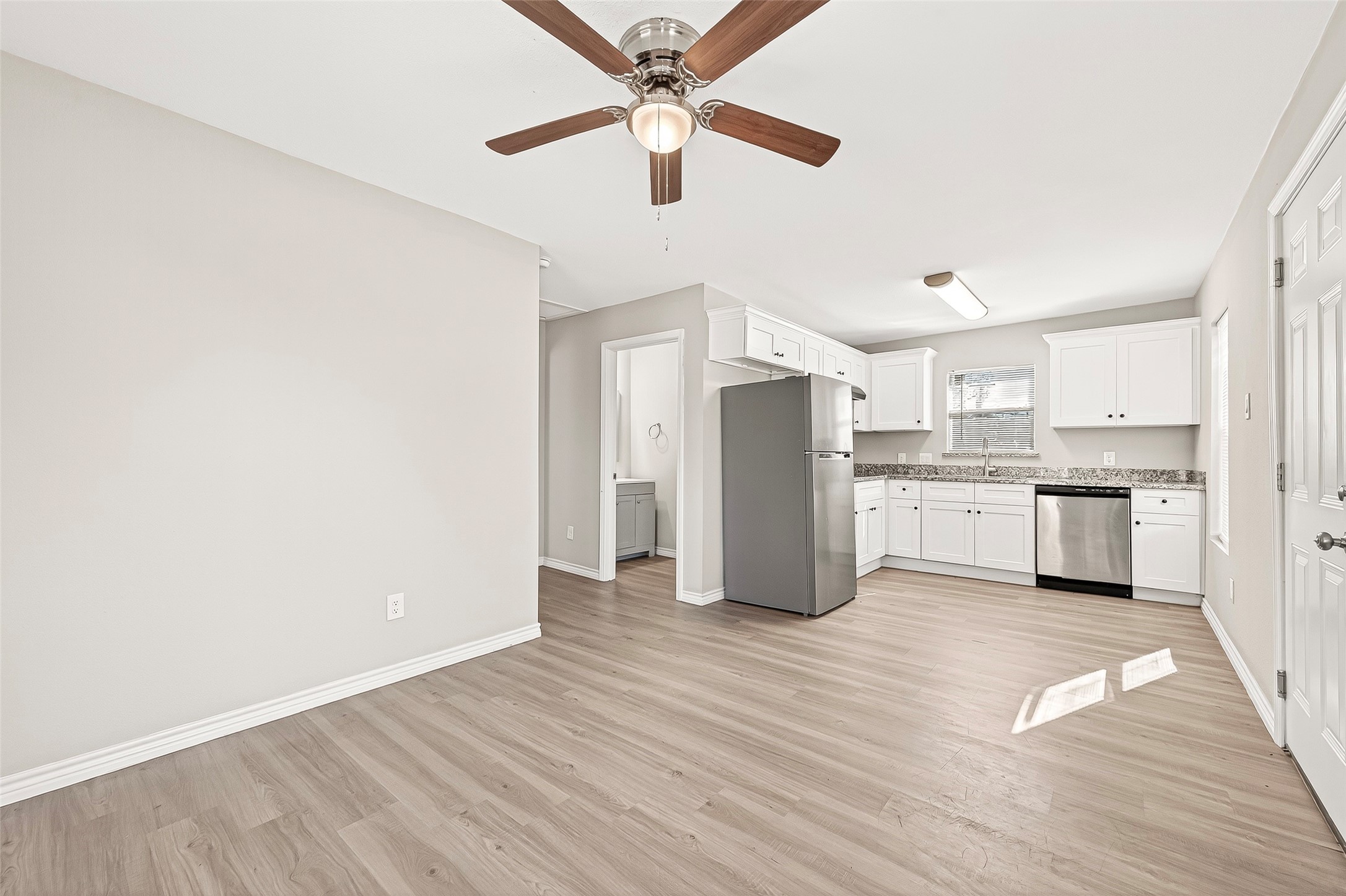 1401 5th Street Rosenberg, TX 77471 - Photo 33 of 50 Unit 210: A view of the kitchen from the
living room