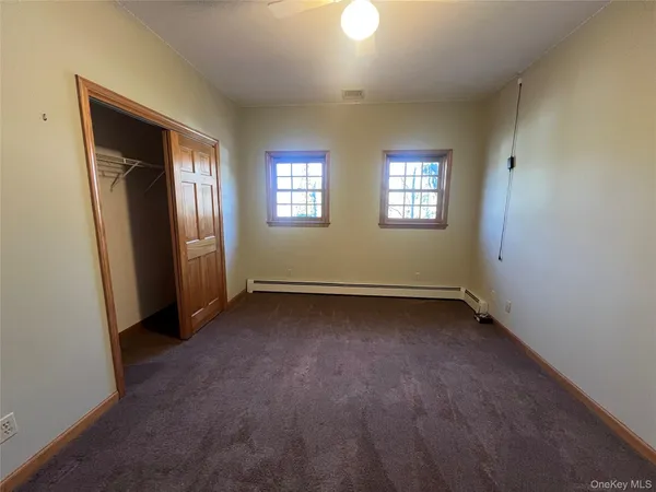 an empty room with windows