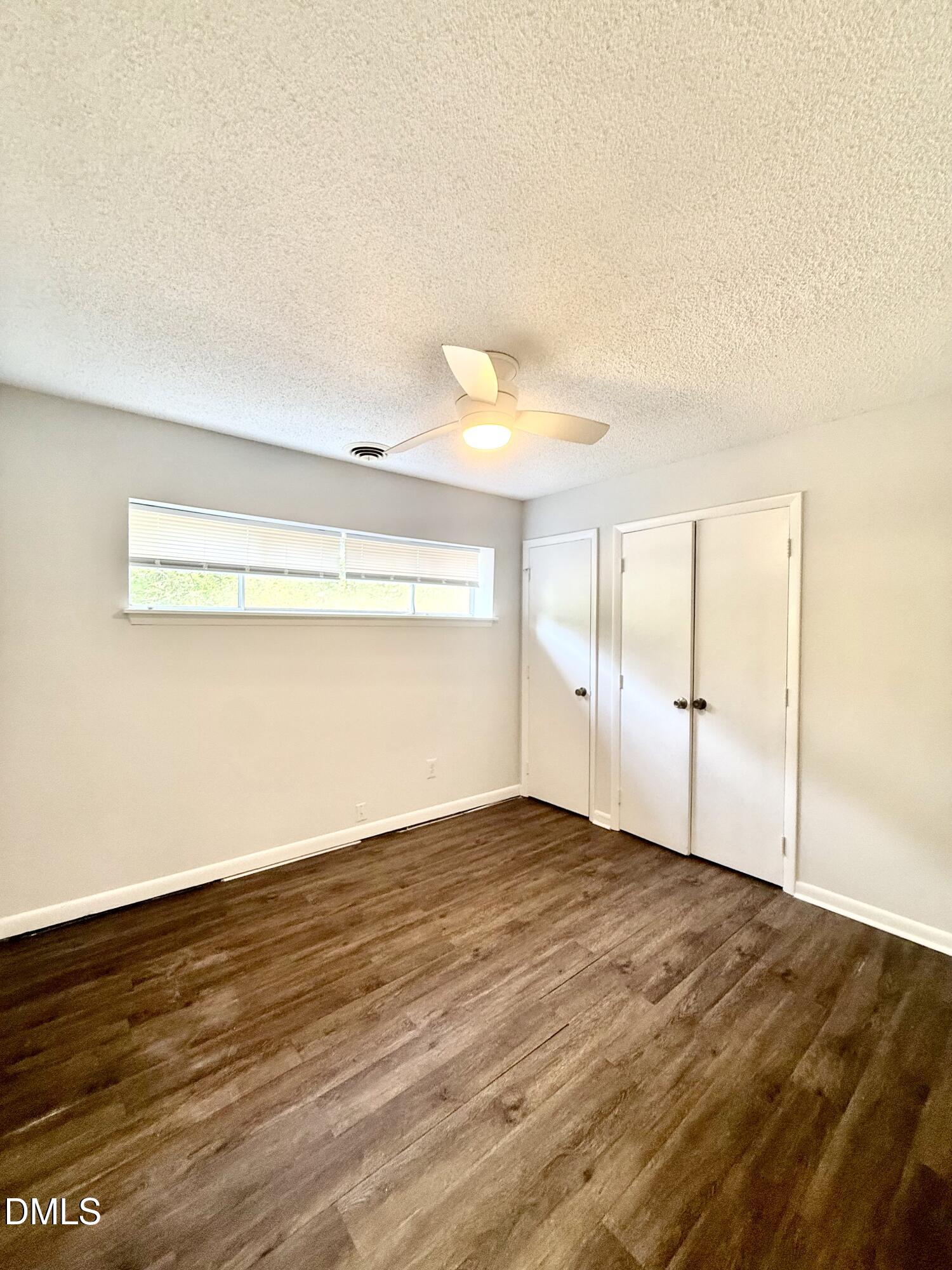 546 Pine Ridge Place Raleigh, NC 27609 - Photo 17 of 28 a view of an empty room and window