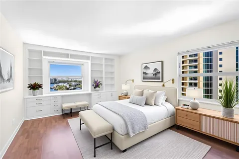 an empty room with wooden floor