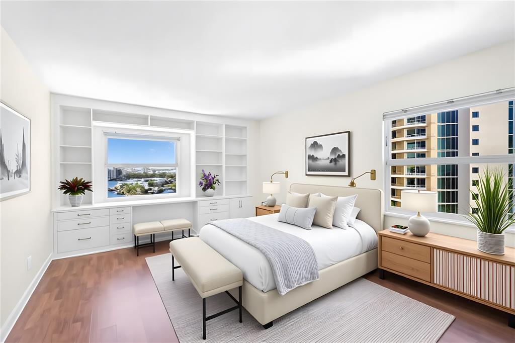 435 South Gulfstream Avenue, Unit 1004 Sarasota, FL 34236 - Photo 20 of 37 a bedroom with a large bed and a window