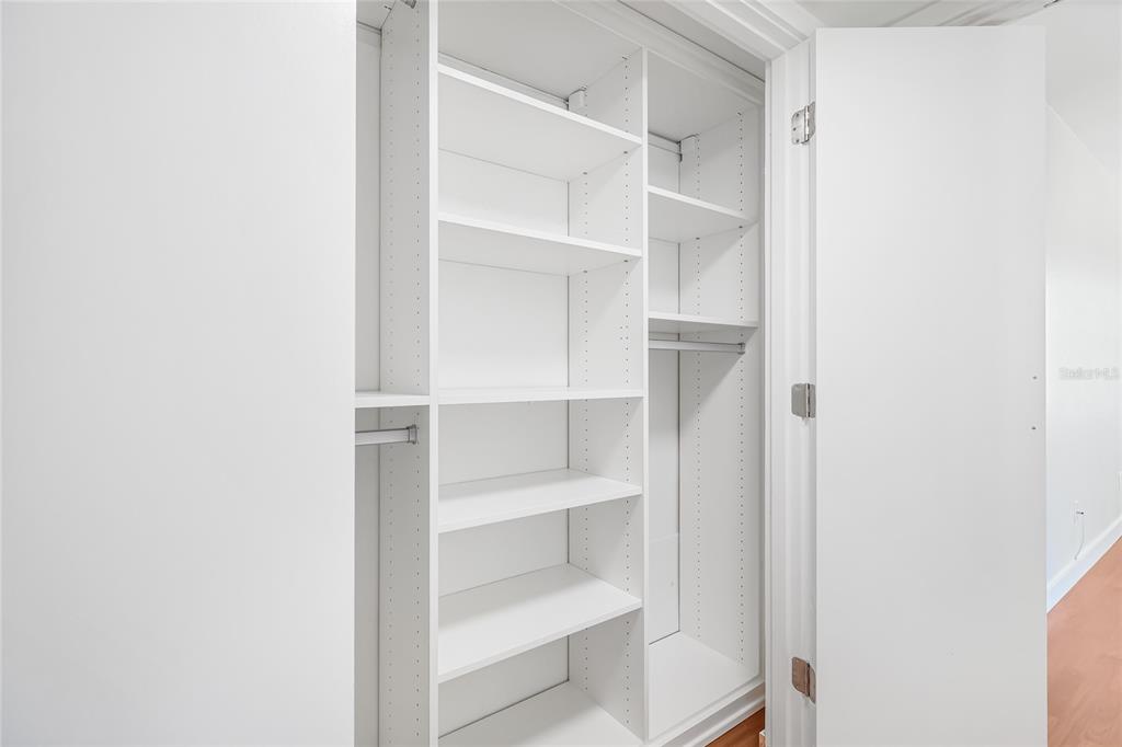 435 South Gulfstream Avenue, Unit 1004 Sarasota, FL 34236 - Photo 23 of 37 a view of an empty walk in closet