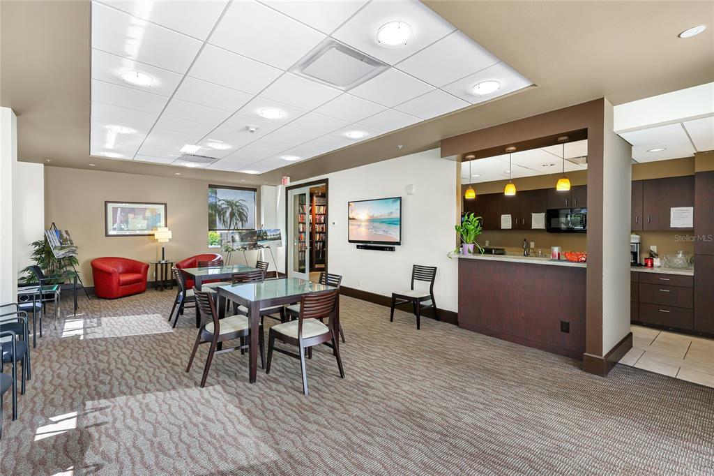 435 South Gulfstream Avenue, Unit 1004 Sarasota, FL 34236 - Photo 30 of 37 a view of a dining room with furniture and window