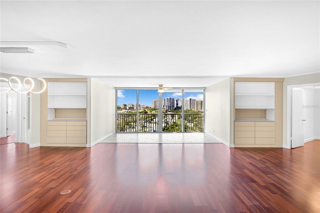 435 South Gulfstream Avenue, Unit 1004 Sarasota, FL 34236 - Photo 3 of 37 a view of a room with wooden floor and window