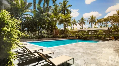 a view of a patio with table and chairs
