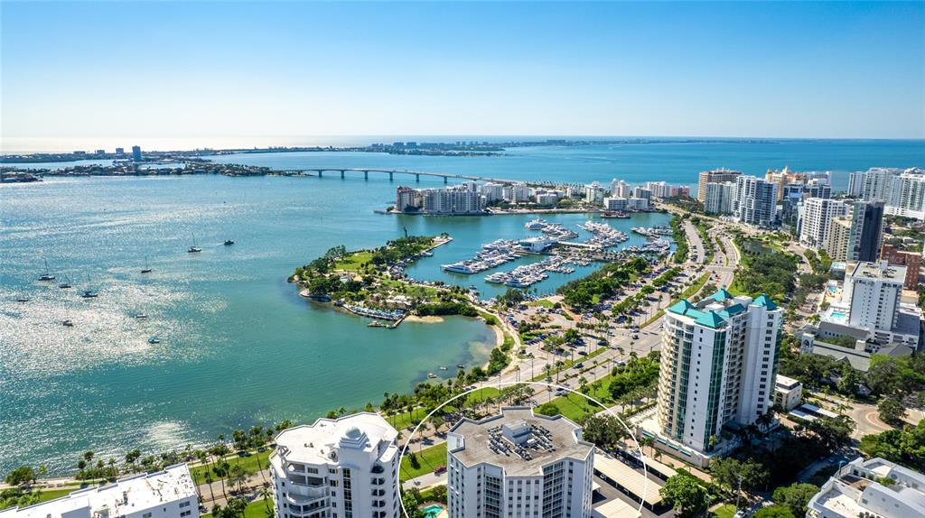 435 South Gulfstream Avenue, Unit 1004 Sarasota, FL 34236 - Photo 35 of 37 a view of a lake with a city