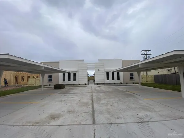 front view of a house with a street