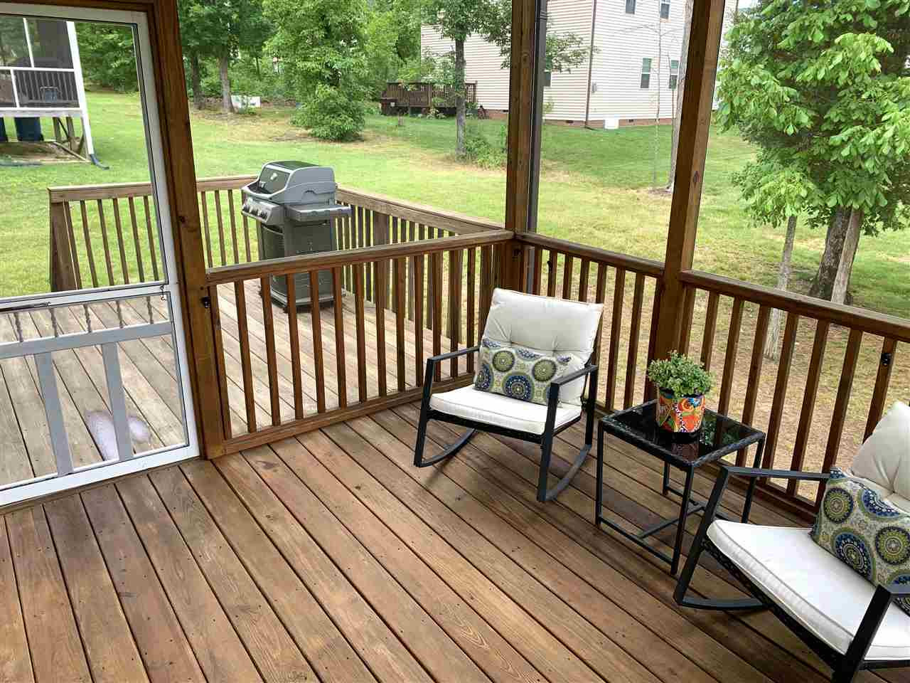 1610 Pattersons Mill Road Durham, NC 27703 - Photo 24 of 28 Everything you need with a hard to find Screen Porch in addition to a deck and green lawn. Screen Porch/ Deck