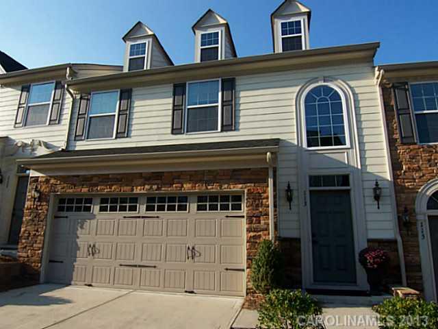 113 Inlet Point Drive, Unit 78 Tega Cay, SC 29708 - Photo 1 of 16 a front view of a house with entryway