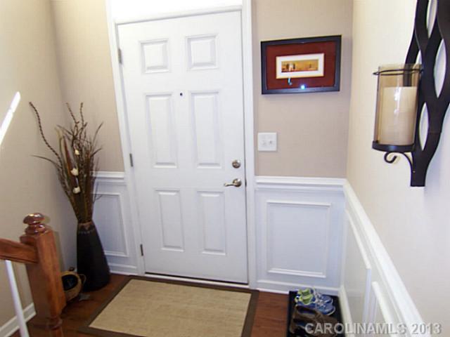 113 Inlet Point Drive, Unit 78 Tega Cay, SC 29708 - Photo 2 of 16 a view of storage and utility room with a window