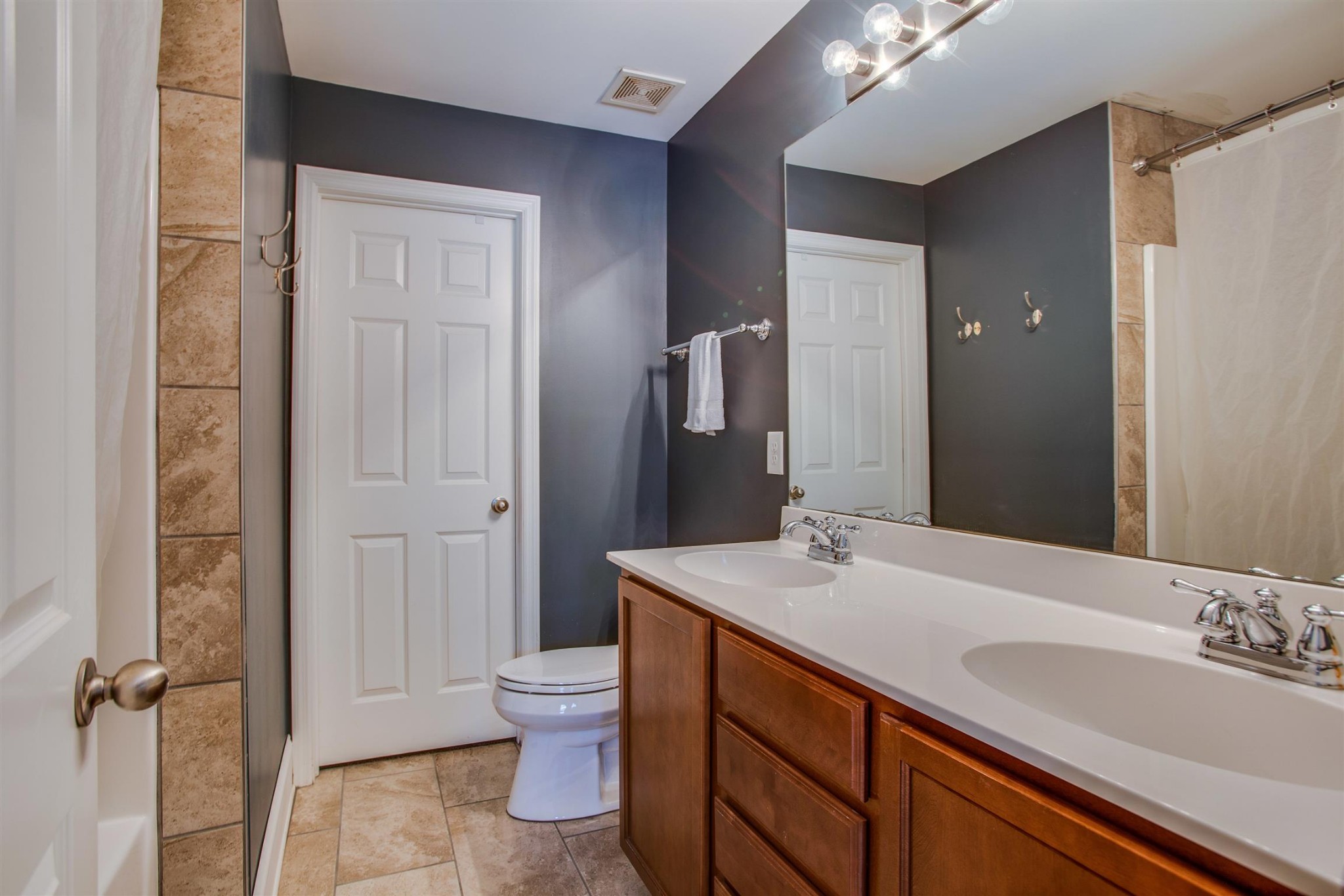 2015 Hemlock Drive Spring Hill, TN 37174 - Photo 13 of 22 a bathroom with a sink and a mirror