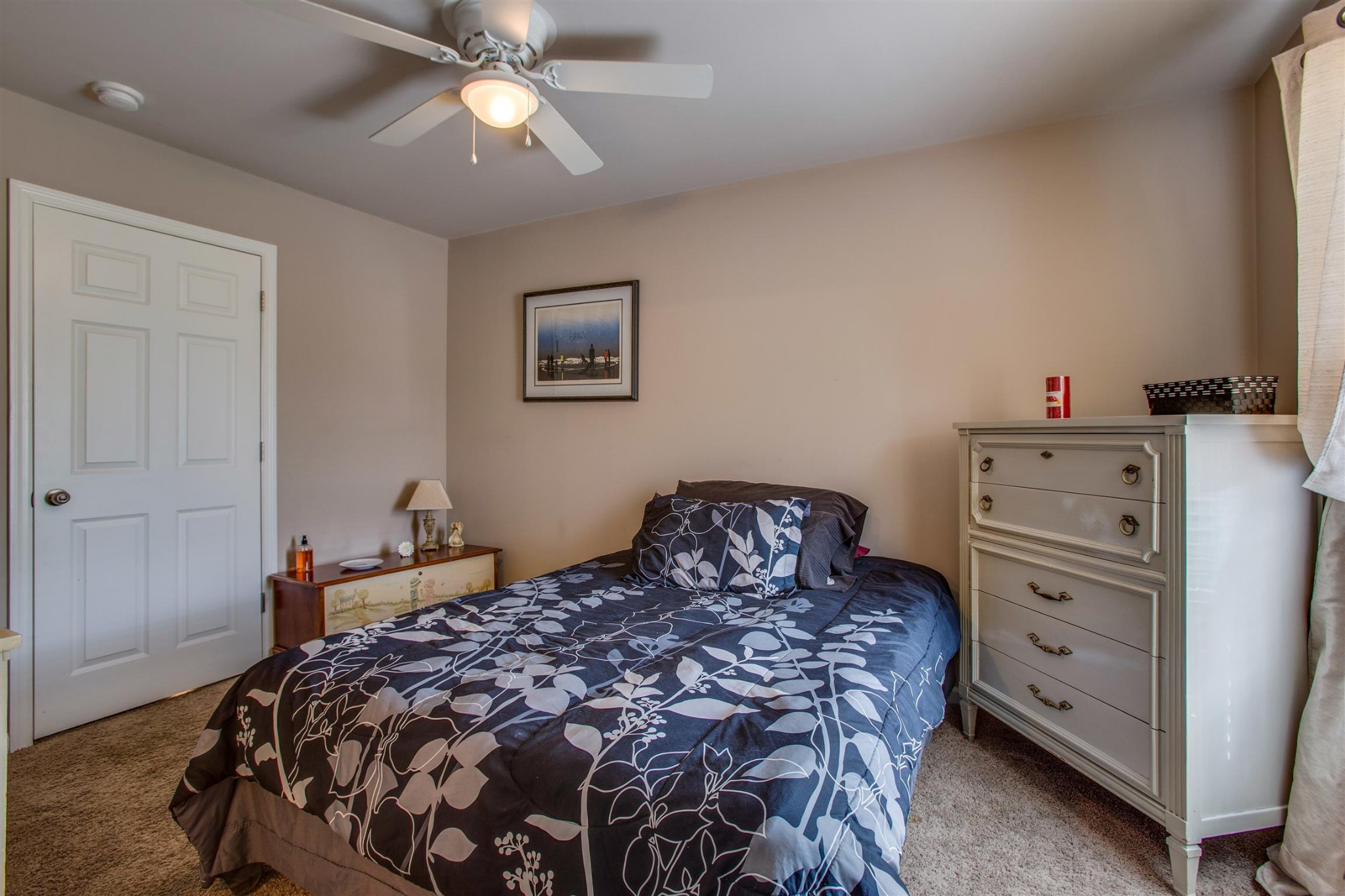 2015 Hemlock Drive Spring Hill, TN 37174 - Photo 14 of 22 a bedroom with a bed and a chandelier