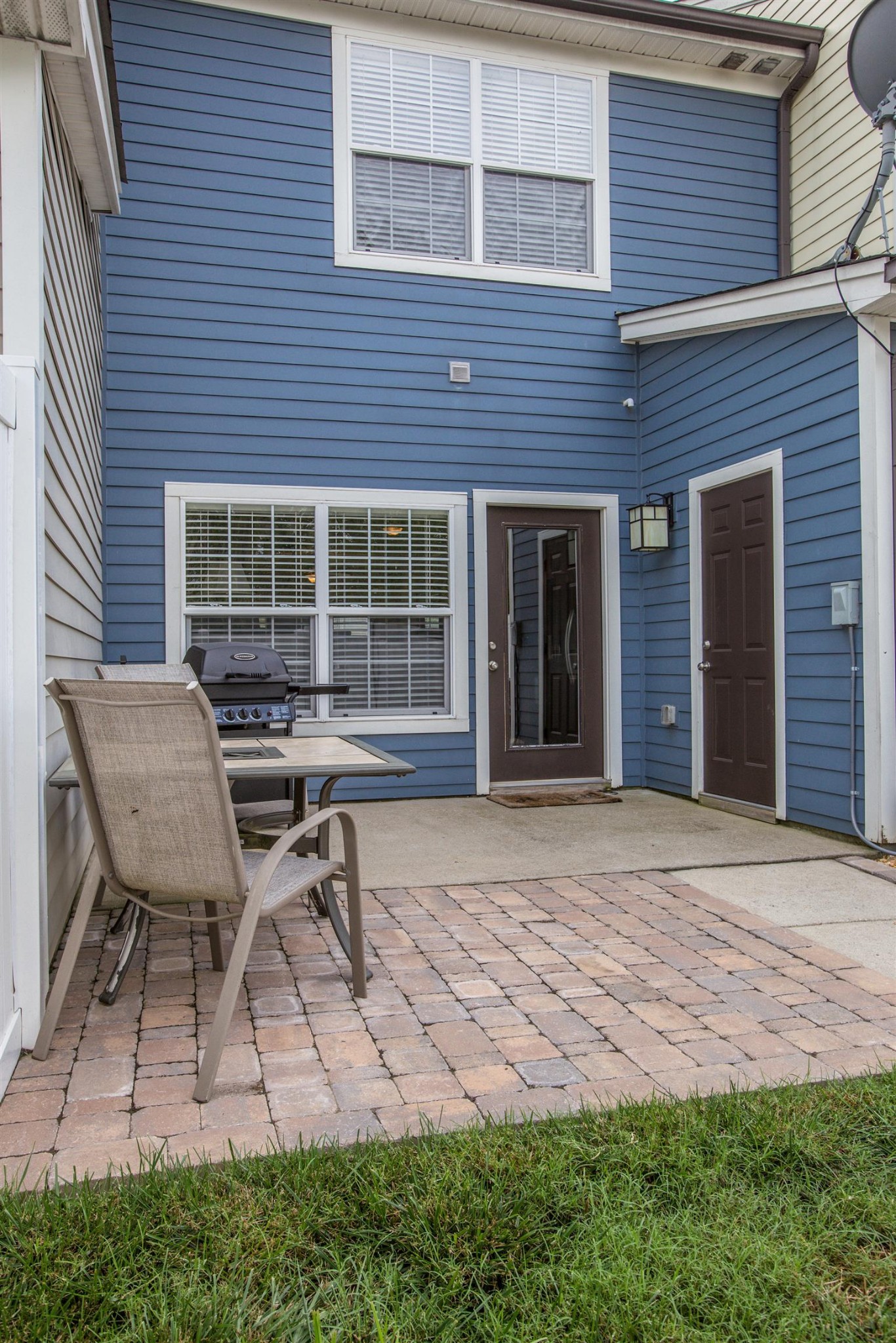 2015 Hemlock Drive Spring Hill, TN 37174 - Photo 17 of 22 a backyard of a house with outdoor seating and a garden