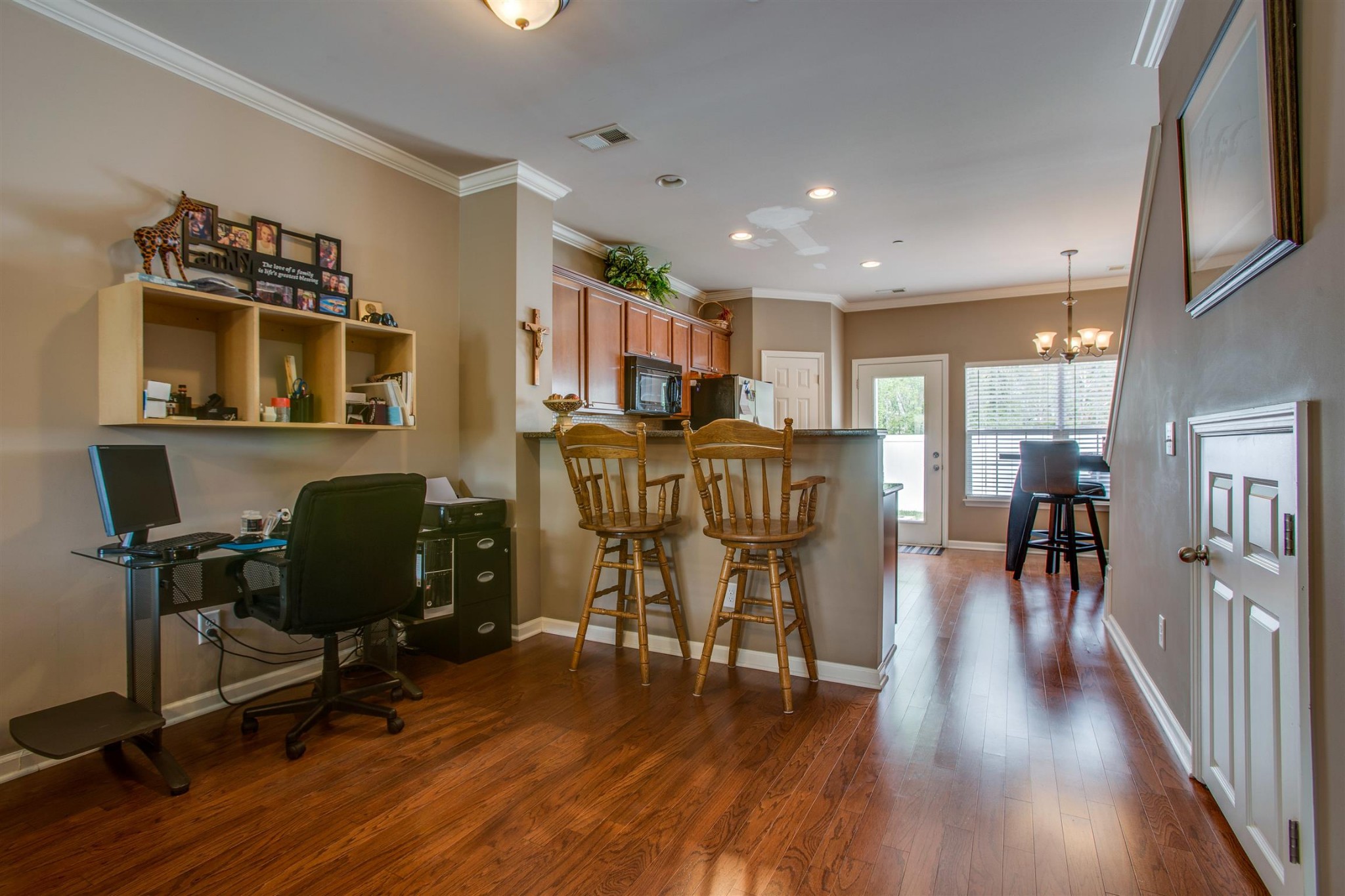 2015 Hemlock Drive Spring Hill, TN 37174 - Photo 4 of 22 a view of a dining room with furniture and wooden floor