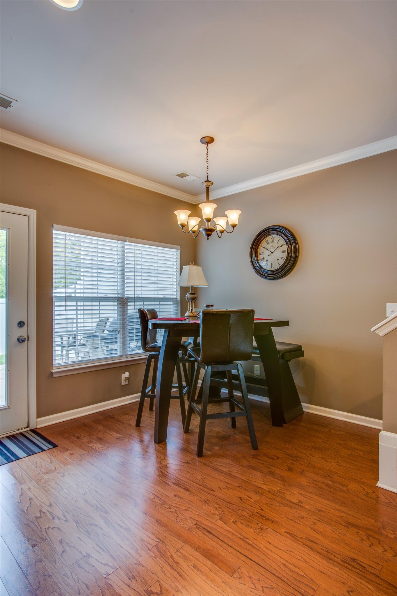 2015 Hemlock Drive Spring Hill, TN 37174 - Photo 10 of 22 a view of a dining room with furniture window and wooden floor