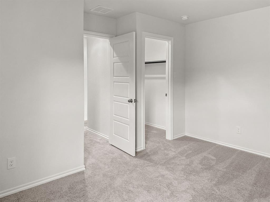 1908 Iris Road Melissa, TX 75454 - Photo 22 of 30 an empty room with closet area
