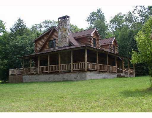 Rd#2 Summit City Road Kennerdell, PA 16374 - Photo 1 of 18 Exterior Front. Welcome to this gorgeous Cedar Log Home on Summit City Road in Kennerdell, PA., Clinton Twp., Venango County. Located in the Franklin School District. Summer view.