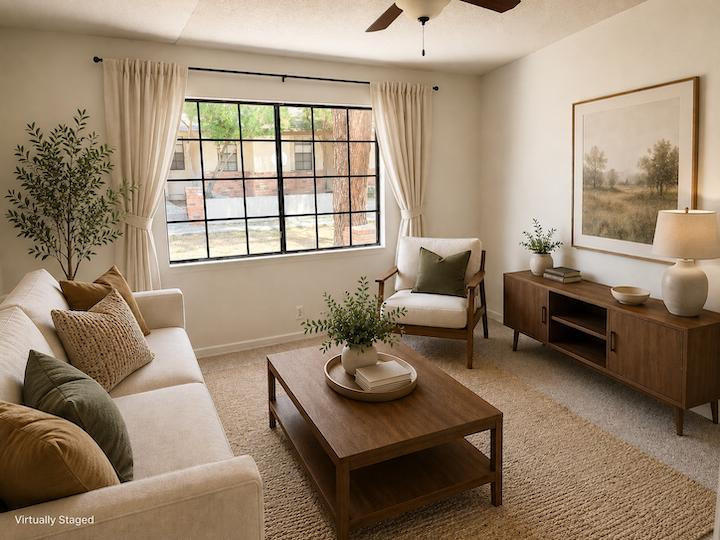 170 East Guadalupe Road, Unit 62 Gilbert, AZ 85234 - Photo 3 of 12 a living room with furniture and a large window