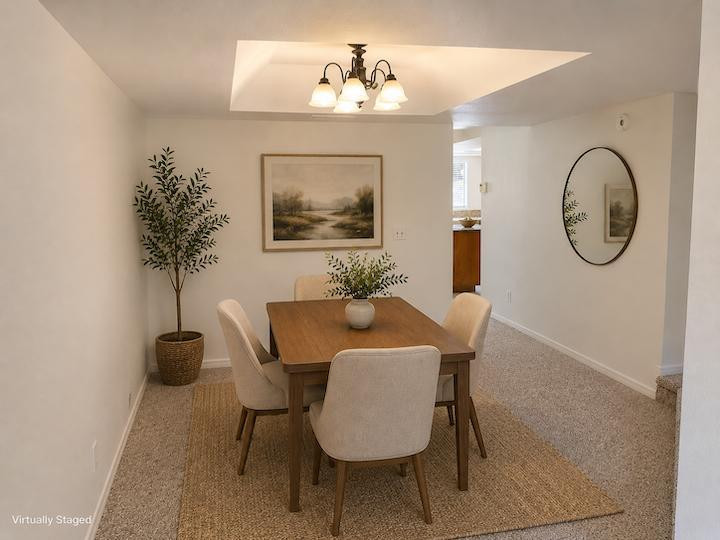 170 East Guadalupe Road, Unit 62 Gilbert, AZ 85234 - Photo 4 of 12 a view of a dining room with furniture and wooden floor
