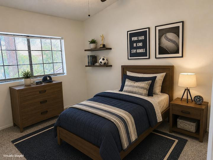 170 East Guadalupe Road, Unit 62 Gilbert, AZ 85234 - Photo 9 of 12 a bedroom with a bed and a window