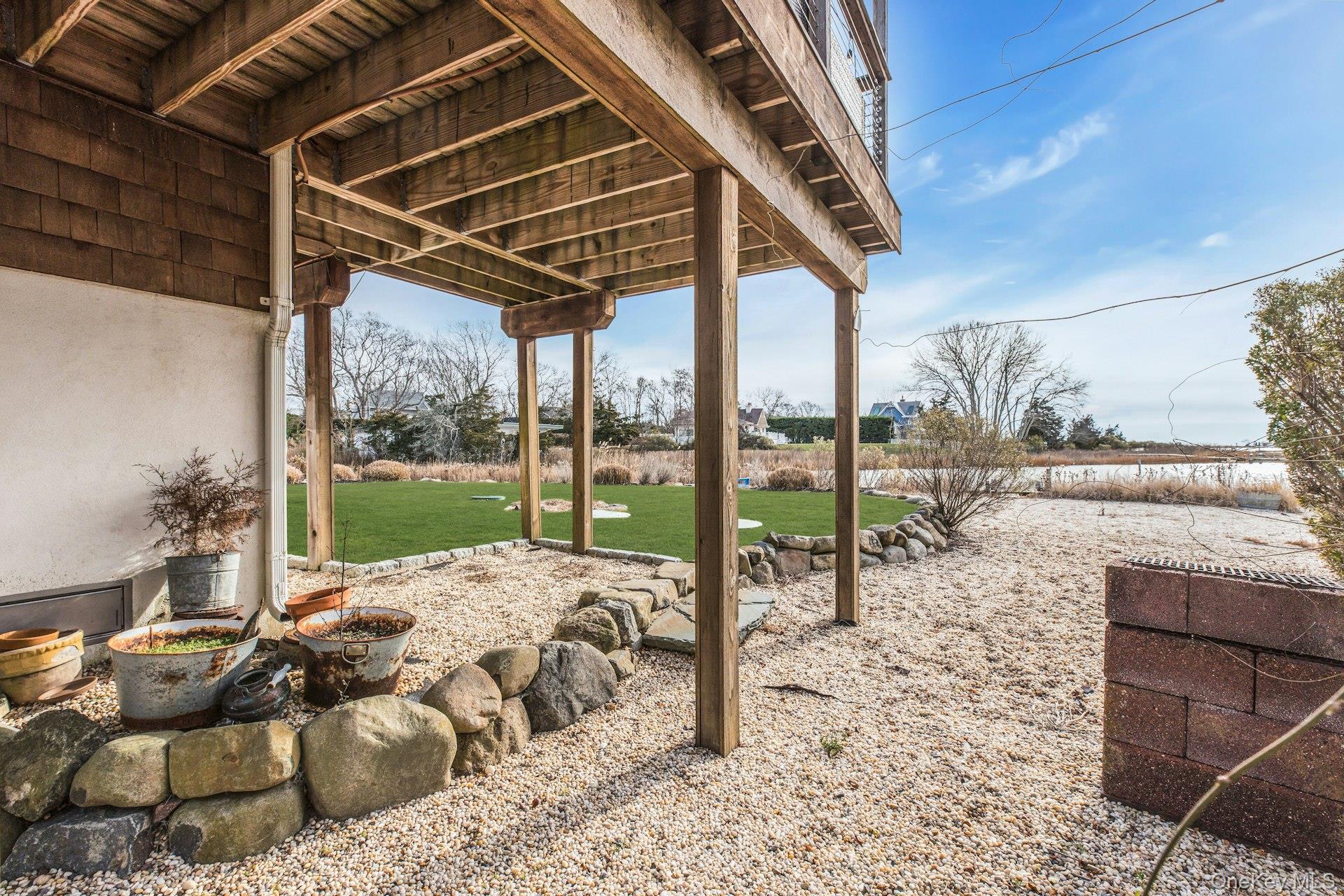 7 Springville Circle Hampton Bays, NY 11946 - Photo 24 of 43 View of patio