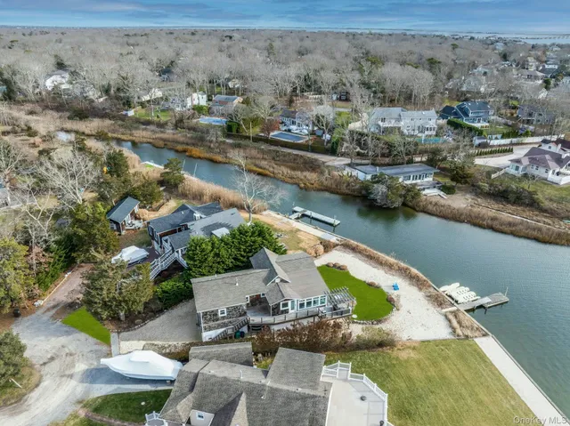 an aerial view of a house with outdoor space