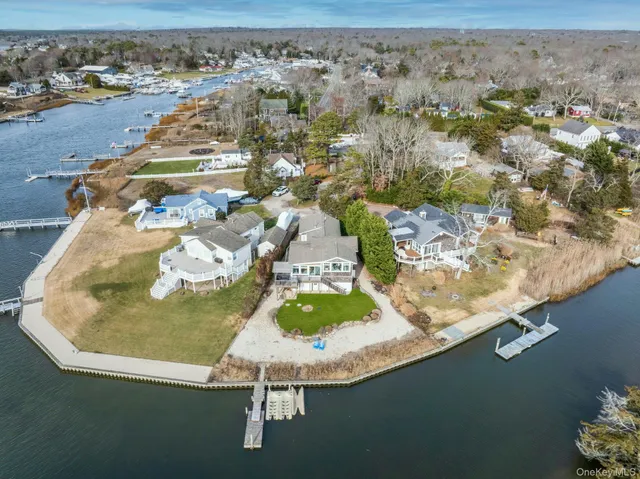 an aerial view of a house with a swimming pool