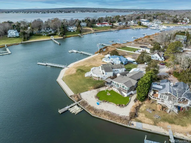 an aerial view of a house with outdoor space
