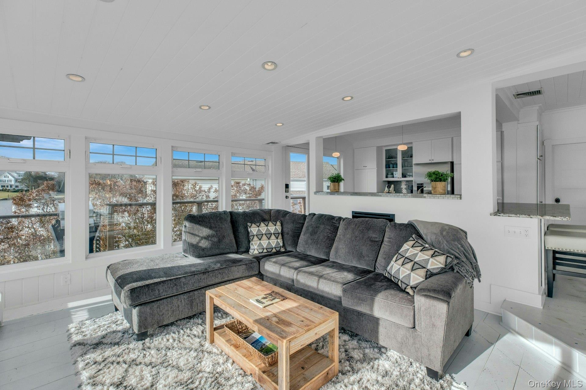7 Springville Circle Hampton Bays, NY 11946 - Photo 5 of 43 Living area featuring recessed lighting