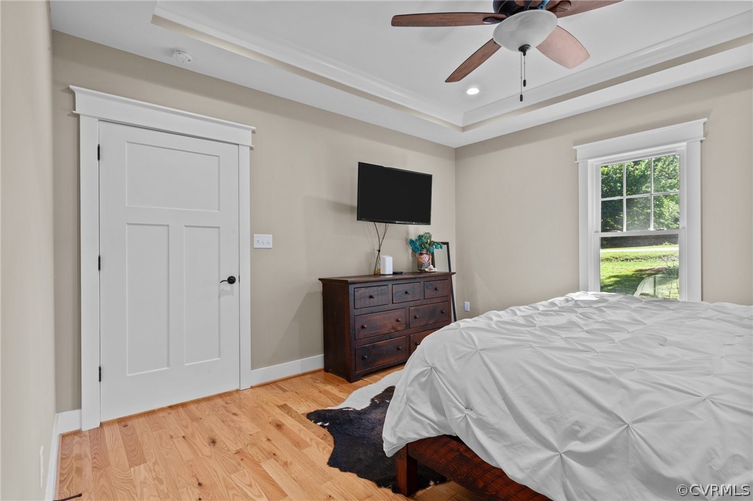 15001 Courthouse Road Dinwiddie, VA 23841 - Photo 23 of 32 a bedroom with a bed and a flat screen tv
