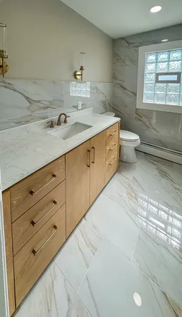 a bathroom with a sink and a toilet
