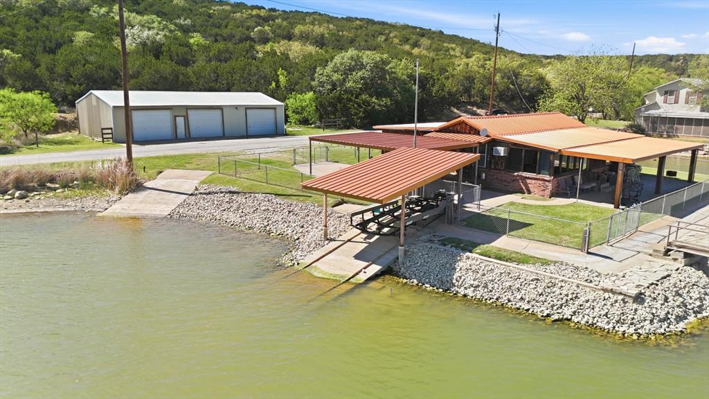 4513 Chapel Road Graham, TX 76450 - Photo 36 of 38 a view of a swimming pool with a patio