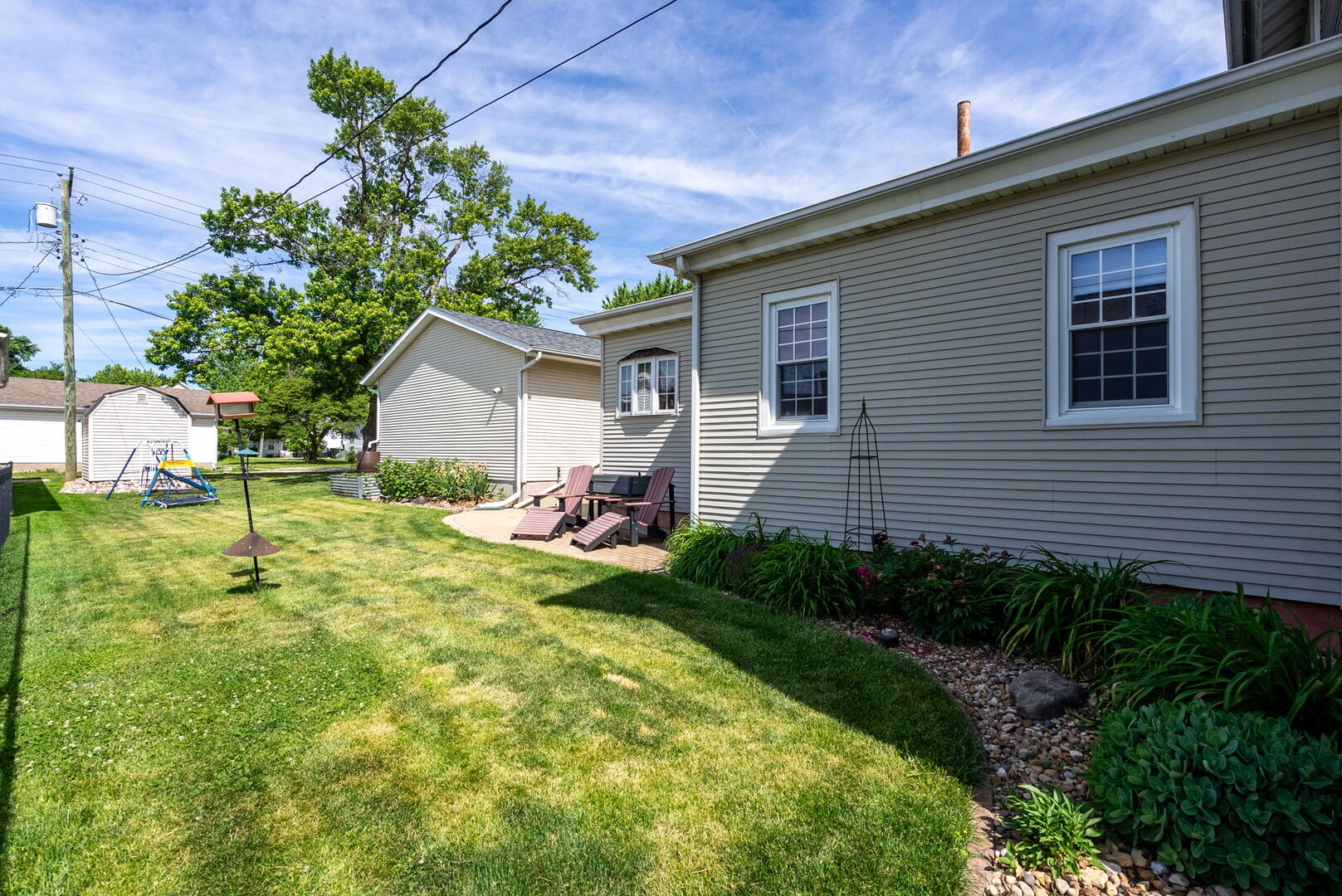 417 North State Street Geneseo, IL 61254 - Photo 41 of 51 a view of a house with backyard and sitting area