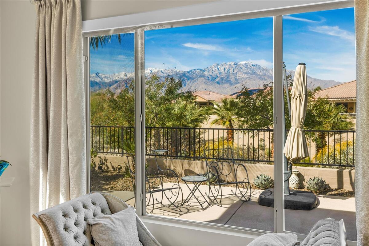 100 Barolo Rancho Mirage, CA 92270 - Photo 25 of 38 a view of a room with a bed and a couch