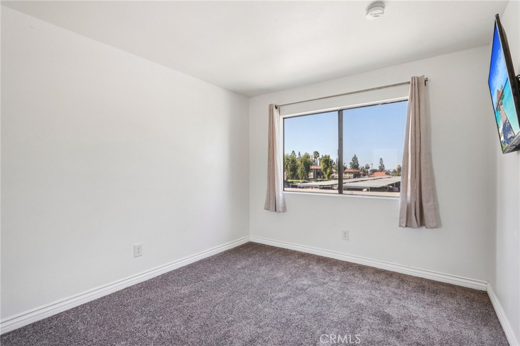 1142 West Blaine Street, Unit 201 Riverside, CA 92507 - Photo 13 of 24 a view of a room that has a window
