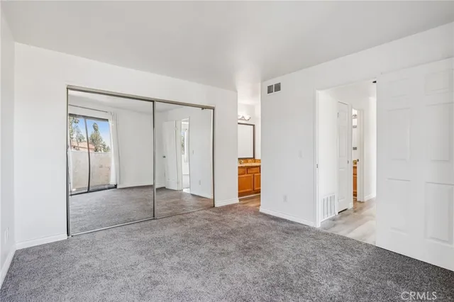 an empty room with a bathroom