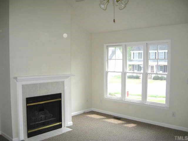 1517 Entheos Lane Raleigh, NC 27610 - Photo 2 of 10 Great living room with cathedral ceiling & gas log fireplace Other