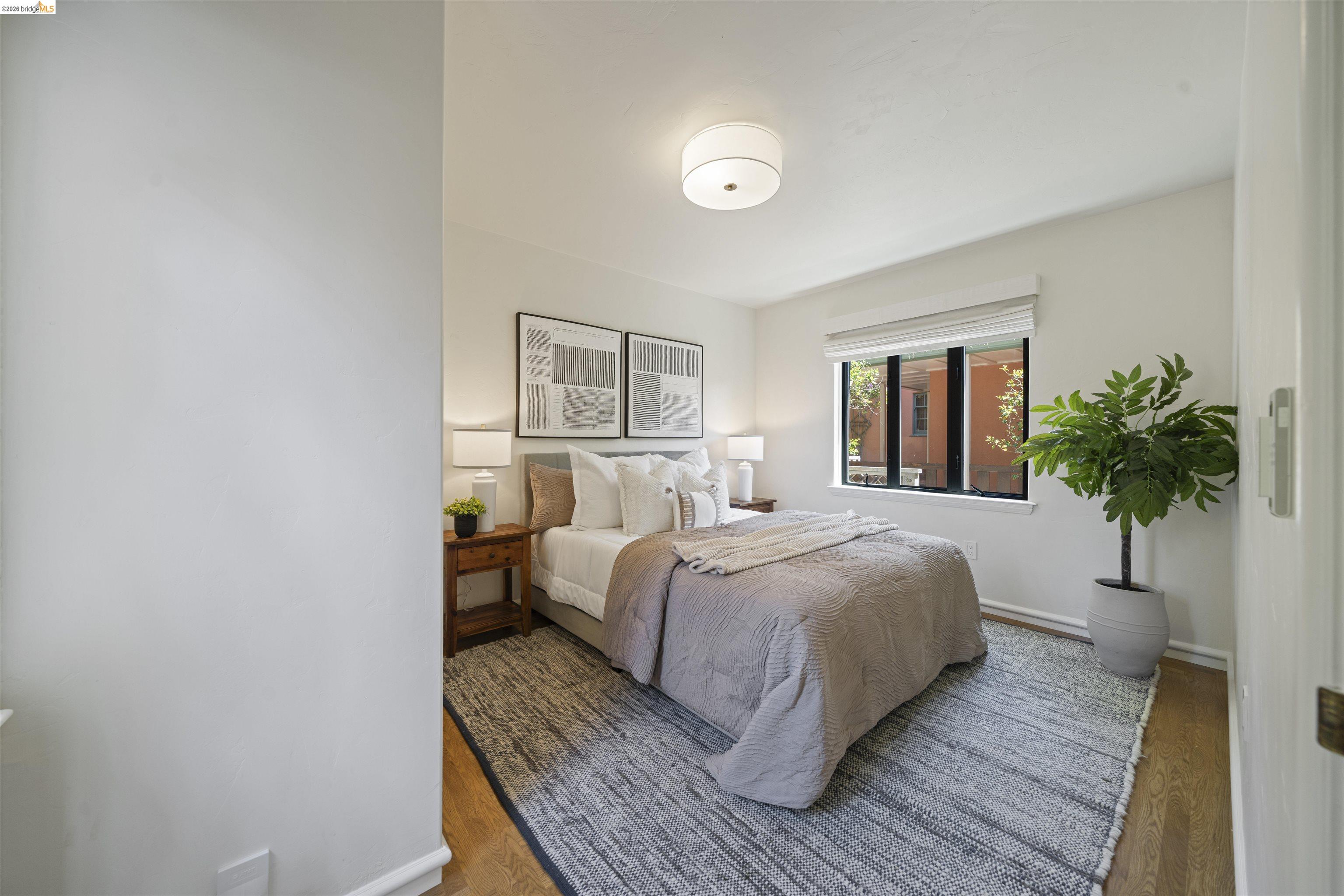 1170 Sterling Avenue Berkeley, CA 94708 - Photo 22 of 52 Bedroom with wood finished floors and baseboards