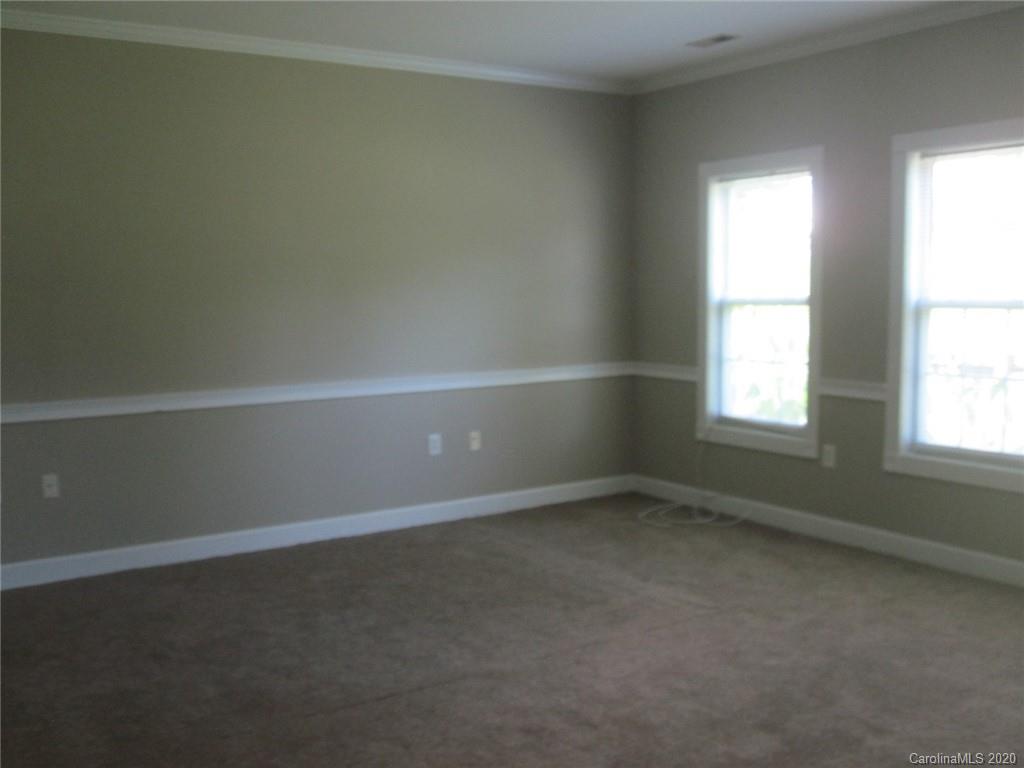 9223 Meadow Vista Road Charlotte, NC 28213 - Photo 2 of 13 an empty room with a window