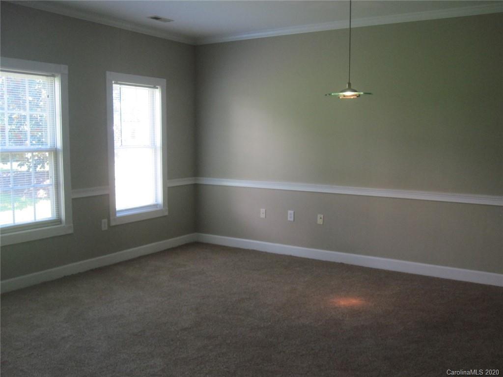 9223 Meadow Vista Road Charlotte, NC 28213 - Photo 3 of 13 an empty room with a window