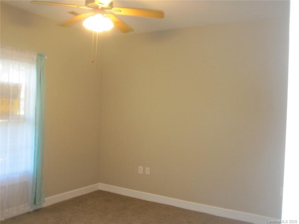 9223 Meadow Vista Road Charlotte, NC 28213 - Photo 6 of 13 a room that has a window in it
