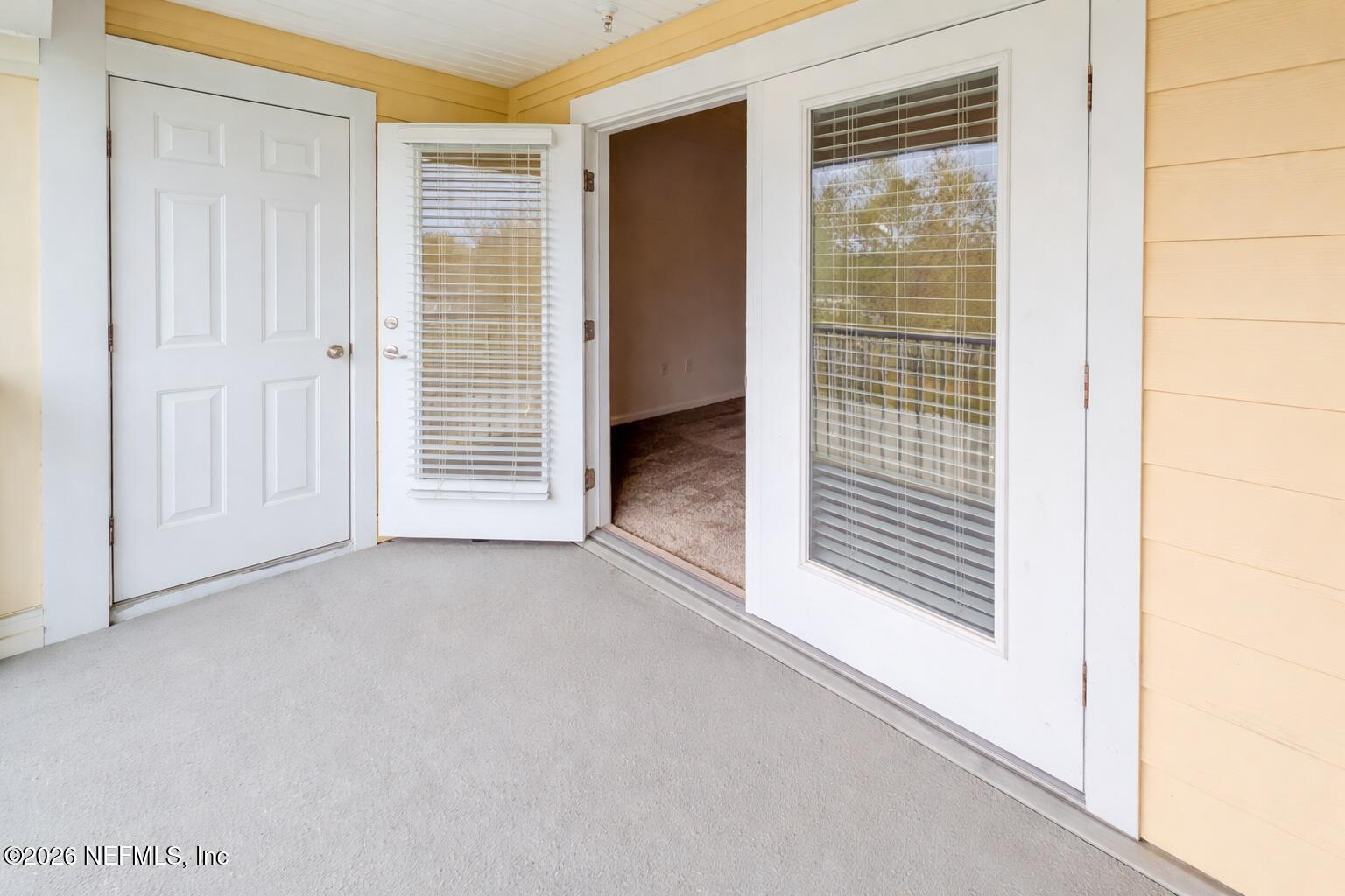 821 Golden Lake Loop St. Augustine, FL 32084 - Photo 16 of 27 a view of a room that has a window in it