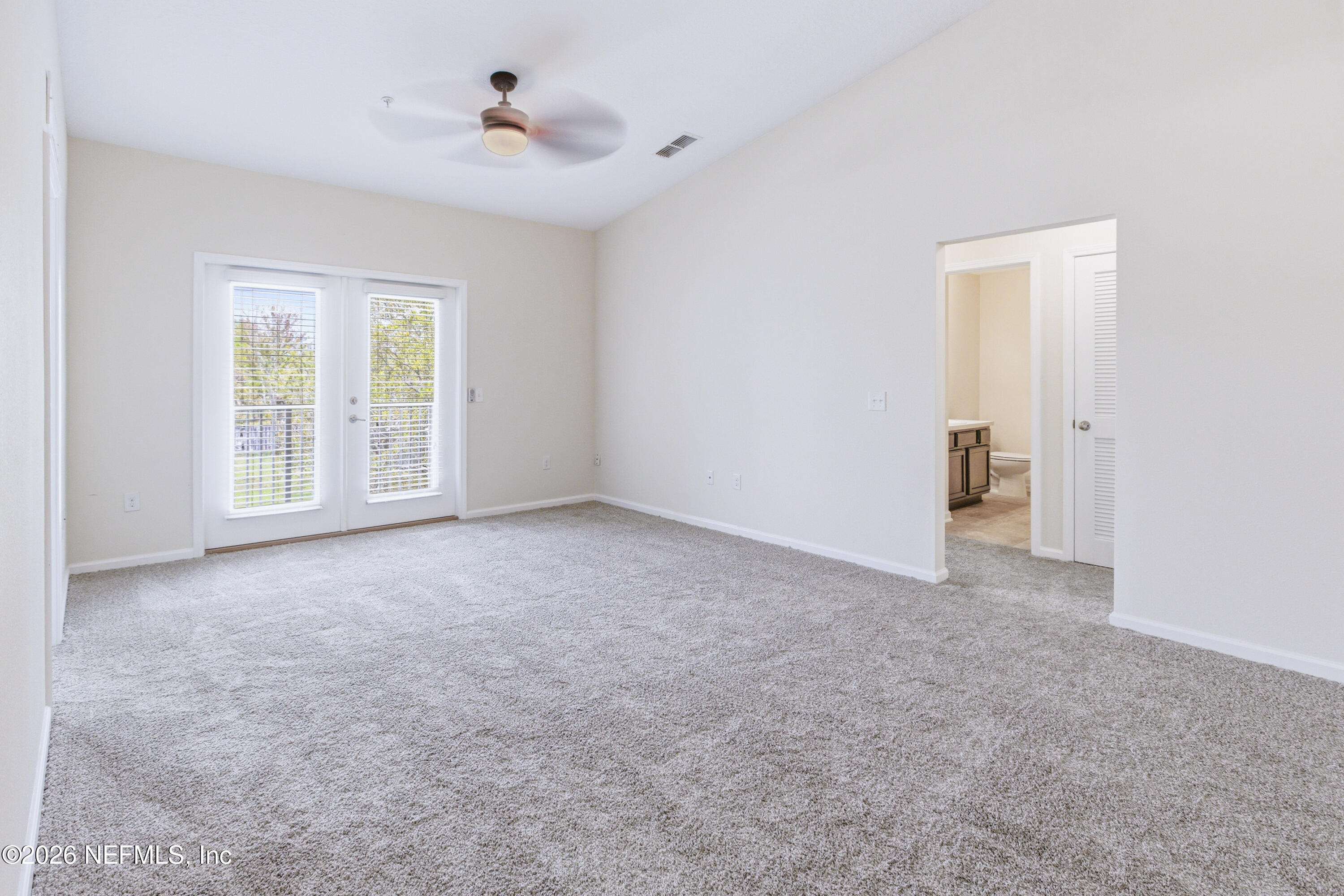 821 Golden Lake Loop St. Augustine, FL 32084 - Photo 2 of 27 a view of an empty room with a window