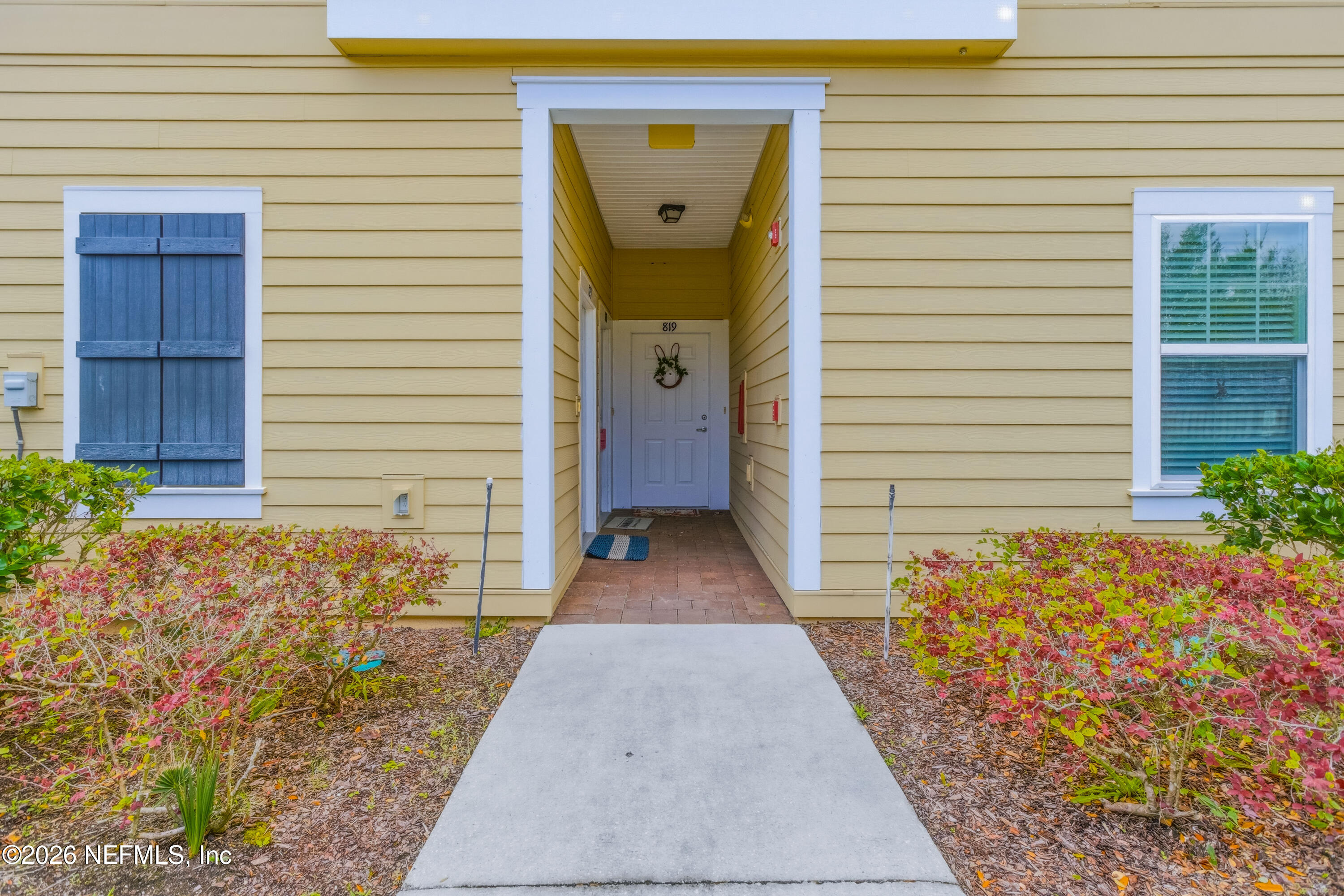 821 Golden Lake Loop St. Augustine, FL 32084 - Photo 21 of 27 a view of a entryway door front of house