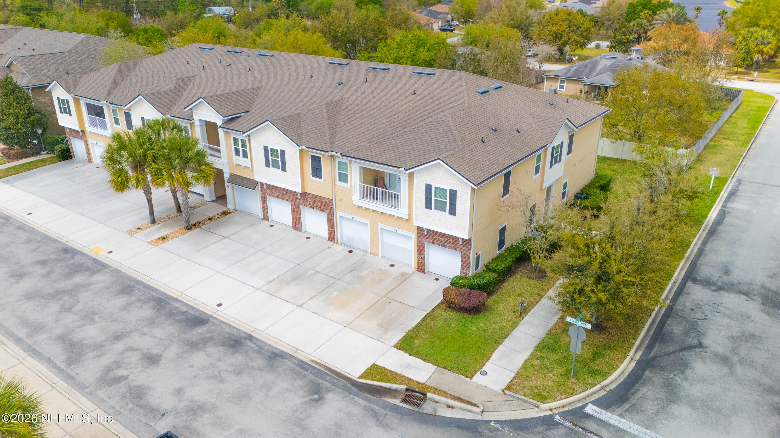 821 Golden Lake Loop St. Augustine, FL 32084 - Photo 23 of 27 an aerial view of a house with a yard and potted plants