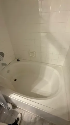a bathroom with a bathtub