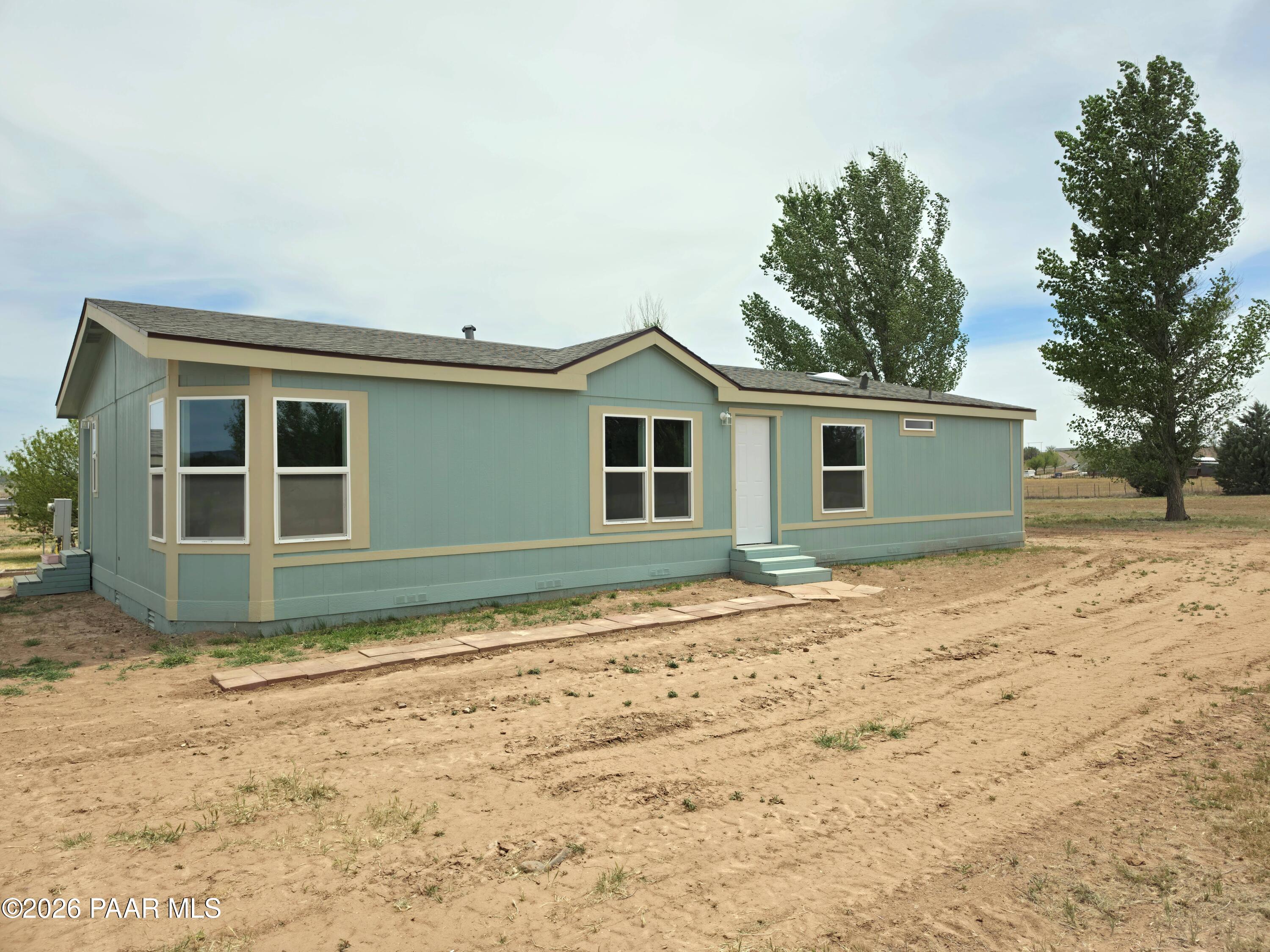 23525 North Ropers Lane Paulden, AZ 86334 - Photo 1 of 25 a view of front door and yard