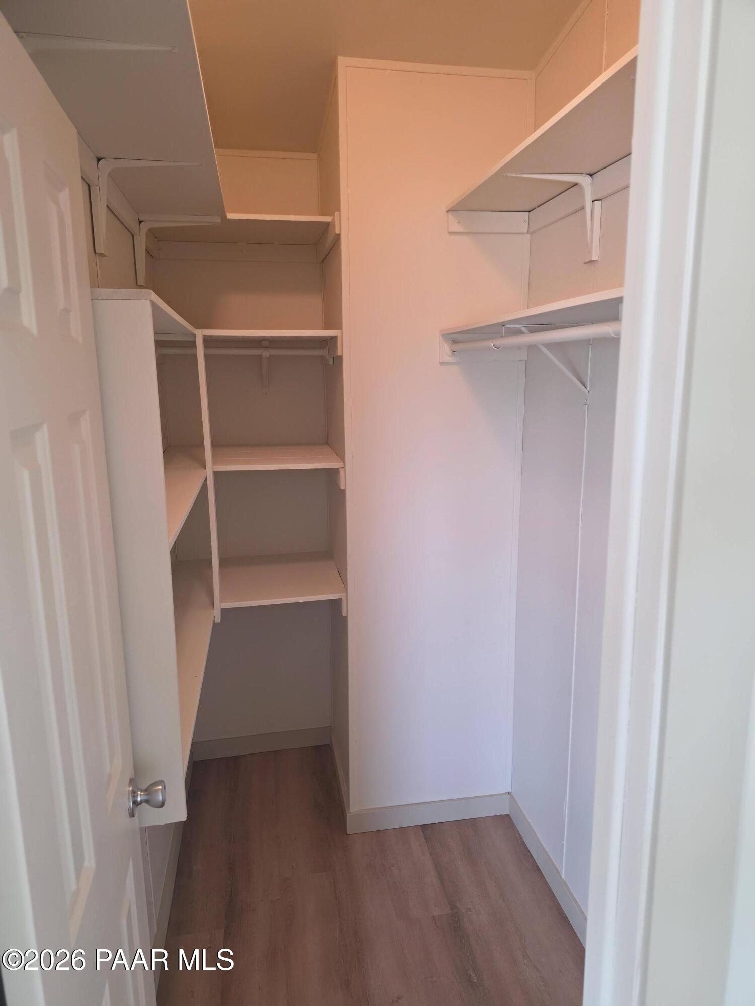 23525 North Ropers Lane Paulden, AZ 86334 - Photo 13 of 25 a view of walk in closet with empty racks